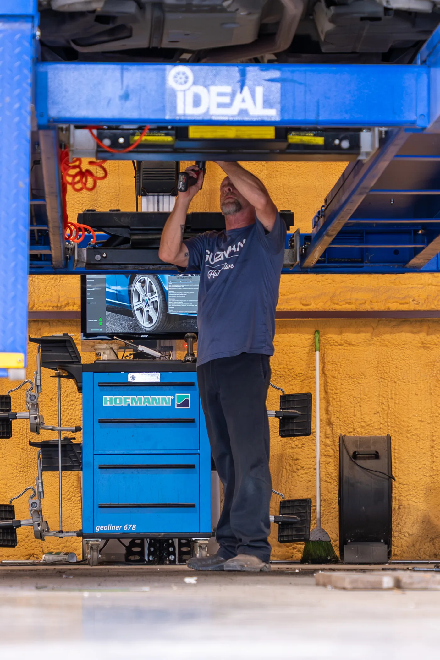 Guzman Automotive technician running computer diagnostics